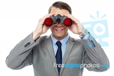 Young Officer Looking Through Binoculars Stock Photo