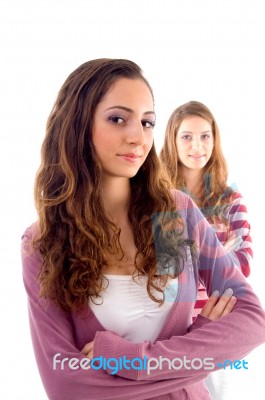 Young One Girl Standing Near To Camera And Another Back Of Her Stock Photo