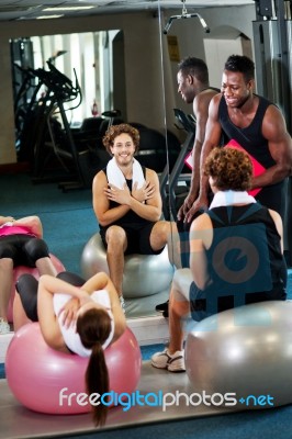 Young people doing exercise Stock Photo