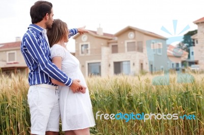Young Romantic Couple Standing Together Stock Photo