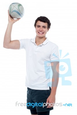 Young Rugby Player Posing Casually Stock Photo