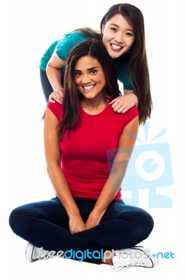 Young Smiling Girls Posing For The Camera Stock Photo