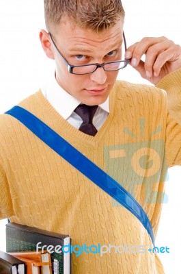 Young Student Holding Books Stock Photo