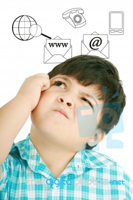 Young Thoughtful Child With Icons Stock Photo