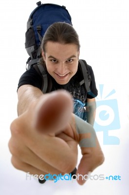 Young Traveler pointing up Stock Photo