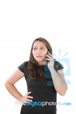 Young Woman Getting Bad News By Phone Stock Photo