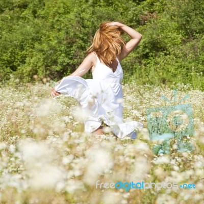 Young Woman In Meadow Stock Photo Young Woman In Meadow Stock Photo