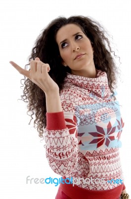 Young Woman Pointing Back Stock Photo