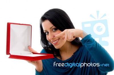 Young Woman Pointing Jewelry Box Stock Photo