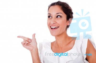 Young Woman Pointing Out Stock Photo
