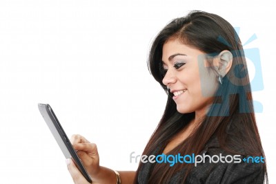 young Woman pressing Tablet PC Stock Photo