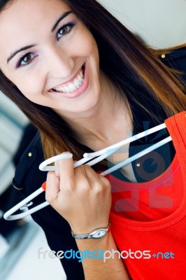 Young Woman Shopping For Clothes Stock Photo