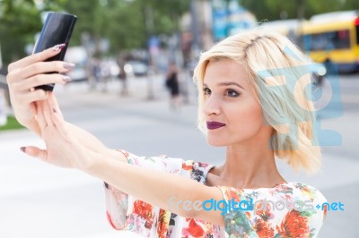 Young Woman Talking A Selfie Stock Photo