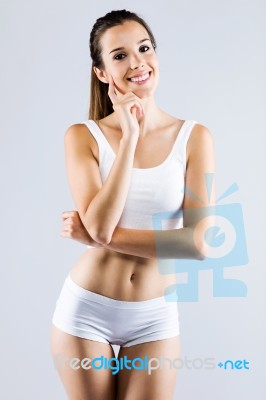 Young Woman With Beautiful Body Posing On White Background Stock Photo