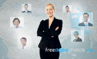 Young Woman With Her World Wide Clients Stock Photo