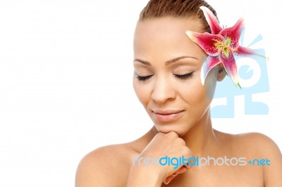 Young Woman With Lily Flower Stock Photo