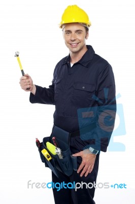 Young Worker Holding Hammer Stock Photo