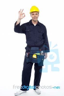 Young Worker Showing Good Gesture Stock Photo