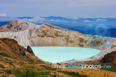 Yugama Crater Lake At Mt. Shirane Stock Photo