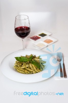 Yummy Pasta Served With Red Wine Stock Photo