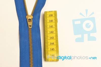 Zipper And Tape Measure Stock Photo