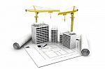 3d Building  Block In Construction And  Crane On Top Of Blueprints Stock Photo