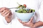 A Bowl Of Fresh Delicious Leafy Green Salad Stock Photo