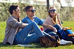 A Group Of Friends Talking In The Street After Class Stock Photo