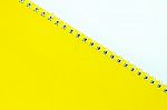 A Yellow Notebook Stock Photo