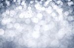 Abstract Blur Silver  Bokeh Lighting From Glitter Texture Stock Photo