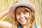 Adorable Little Girl With The Summer Hat Stock Photo