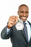 African Businessman With Clock, Time Concept Stock Photo