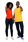 African Couple Showing Thumbs Up Stock Photo
