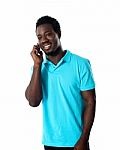African Guy Talking Over Phone Stock Photo