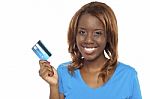 African Lady Holding Credit Card Stock Photo