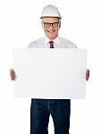 aged Architect showing Blank board Stock Photo