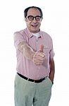 Aged Male Gesturing Thumbs Up Stock Photo