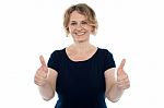 Aged Woman Showing Thumbs Up Stock Photo