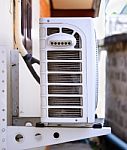 Air Compressor On The Home Wall Stock Photo