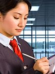 Airport Staff Making Notes Stock Photo