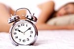 Alarm Clock And Woman Stock Photo