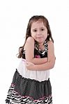 Angry Little Girl In Dress With Arms Crossed On White Background Stock Photo