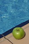 Apple At The Pool Stock Photo