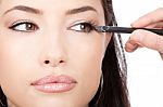 Applying Cosmetic Pencil Stock Photo