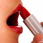 Applying Red Lipstick Stock Photo