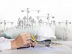 Architect Working On Talbe With Sketching And Building Construct Stock Photo