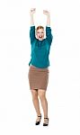 Arms Raised Young Woman Stock Photo