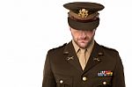 Army Man Looking Down, Filled With Shame Stock Photo