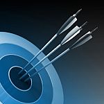 Arrows Hitting The Center Of Target - Success Business Concept Stock Photo
