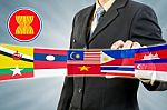 Asean Economic Community In Businessman Hand Stock Photo